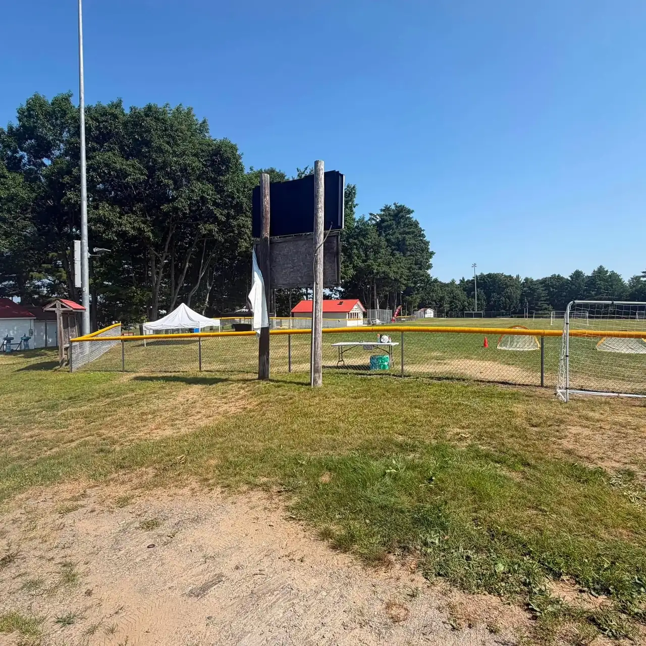 Chain link fencing around a sports field