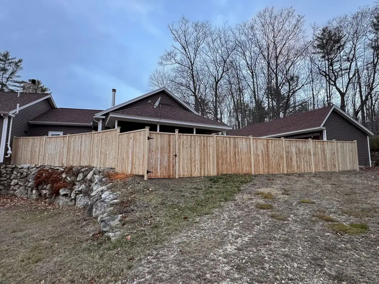 Wood privacy fencing beside a home